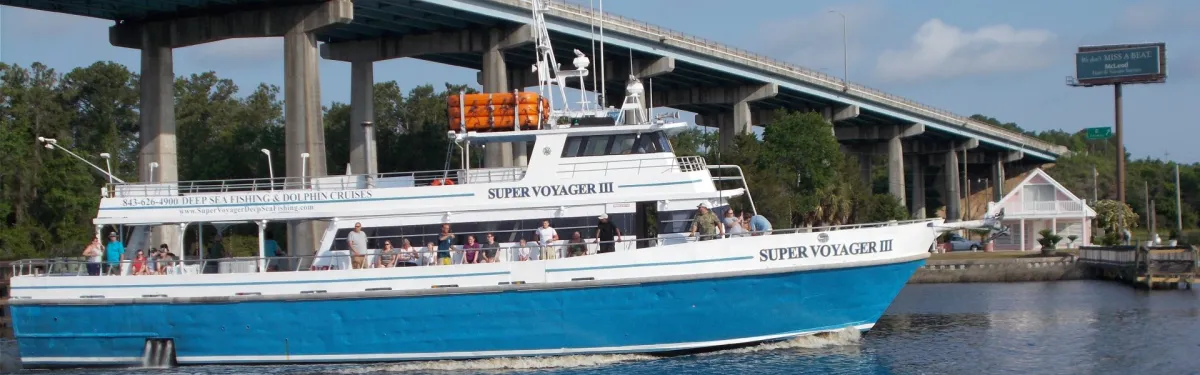 a boat is docked next to a body of water
