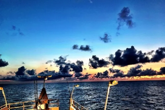 a small boat in a body of water