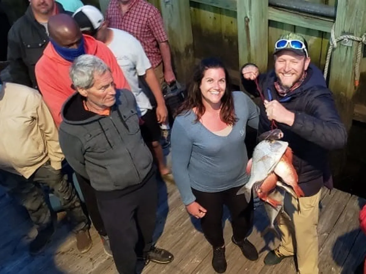 a group of people posing for the camera