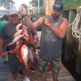 Walter Willison holding a fish
