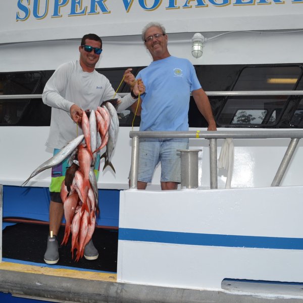 a man riding on the back of a truck