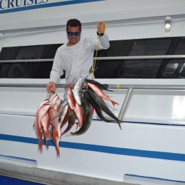 a man standing on a boat