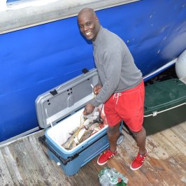 a person in a blue suitcase