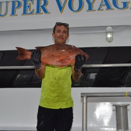 a person standing posing for the camera