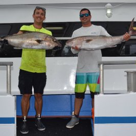 a person holding a fish