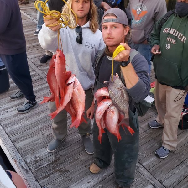 a group of people posing for the camera