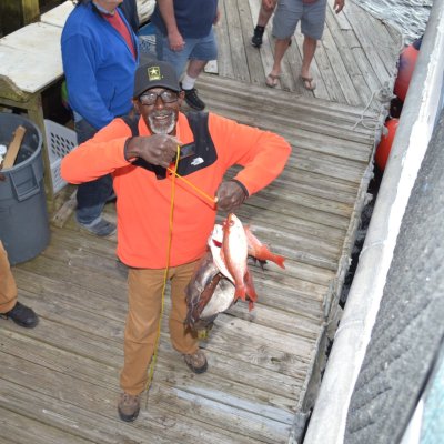 a group of people walking in the snow