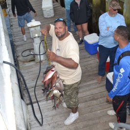 a group of people around each other