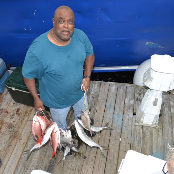 Orange and a dog posing for the camera