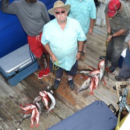 a group of people standing on top of a ramp