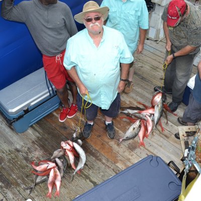 a group of people standing on top of a ramp