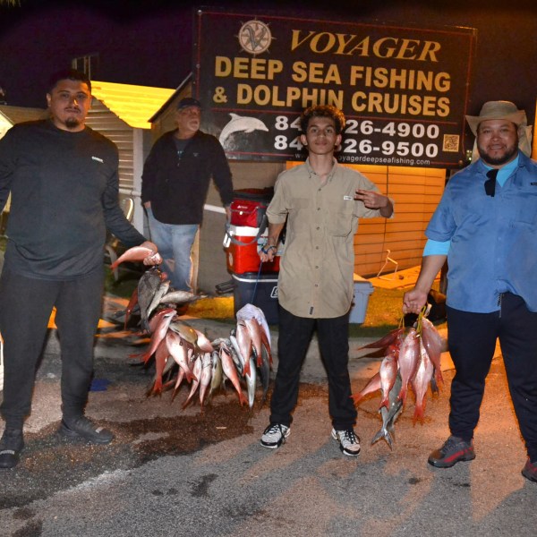 a group of people posing for the camera