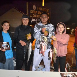 a group of people posing for a photo