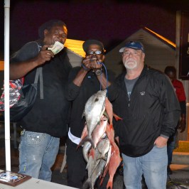 a person holding a fish