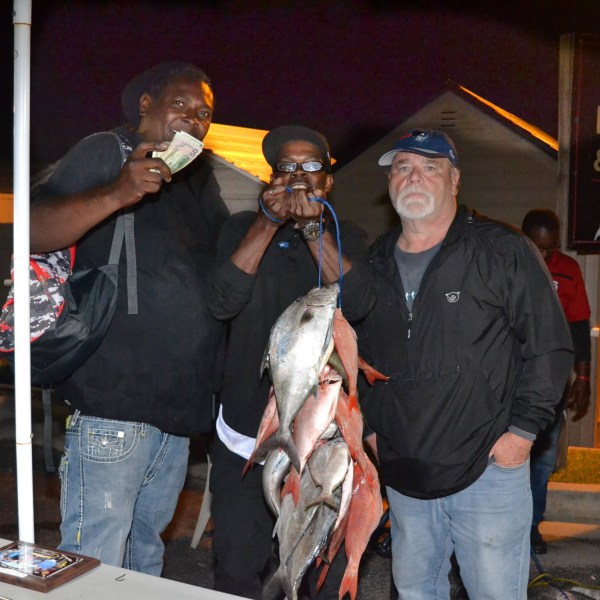 a person holding a fish