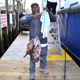 a man standing on a boat