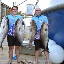 a person holding a fish