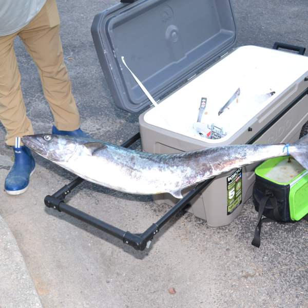 a piece of luggage sitting on top of a suitcase