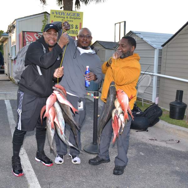 a group of people holding a sign