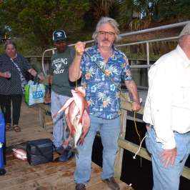 a group of people posing for the camera
