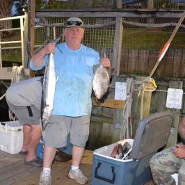 a man holding a bag of luggage