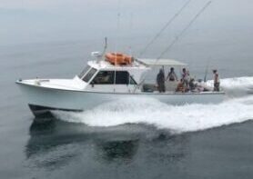 a small boat in a body of water