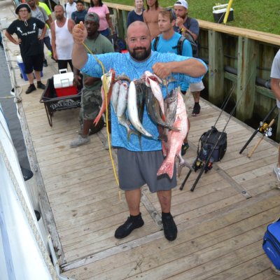 a group of people standing in front of a crowd