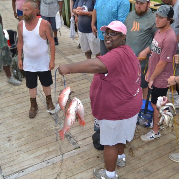 a group of people standing in front of a crowd