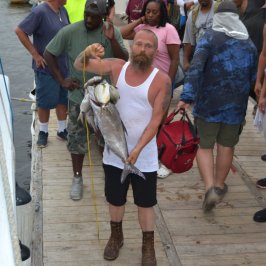 a group of people standing in front of a crowd