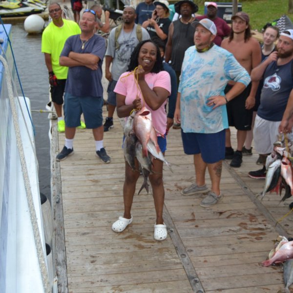 a group of people standing in front of a crowd