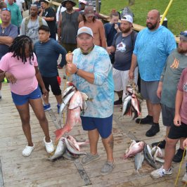 a group of people standing in front of a crowd