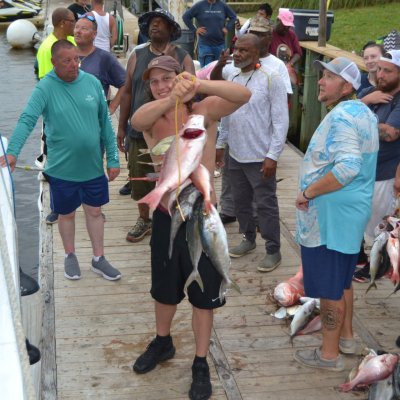 a group of people standing in front of a crowd