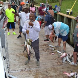 a group of people standing in front of a crowd
