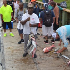 a group of people standing in front of a crowd