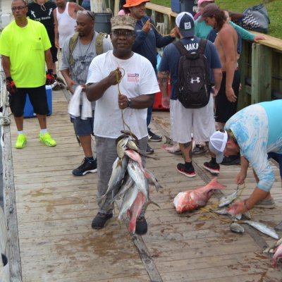 a group of people standing in front of a crowd