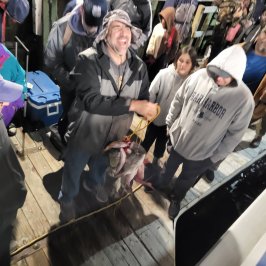 a group of people standing in front of a crowd