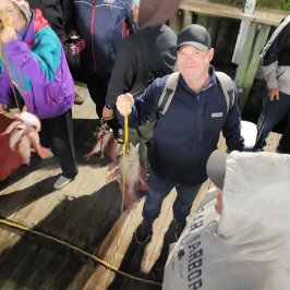 a group of people standing in front of a crowd