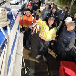 a group of people standing in front of a crowd