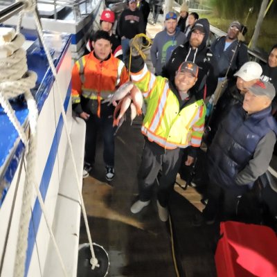 a group of people standing in front of a crowd