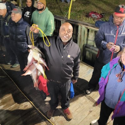 a group of people posing for the camera