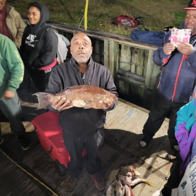 a group of people posing for the camera