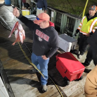 a group of people standing in a room