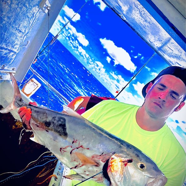 a man wearing a blue hat