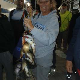 a person holding a fish