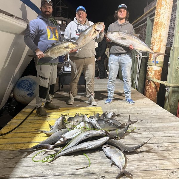 a person holding a fish